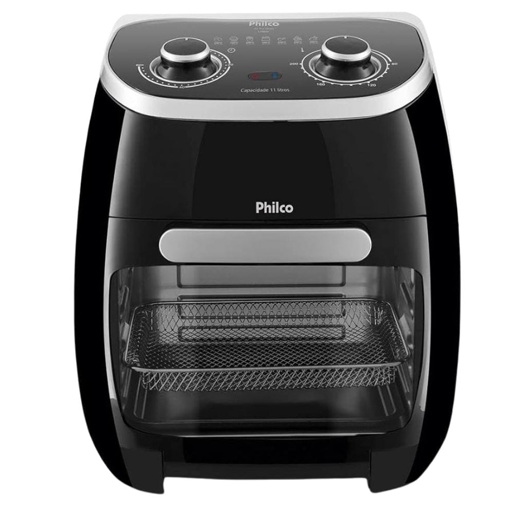 Foto da Fritadeira Air Fryer Oven Philco de 11 litros, modelo PFR2000P, na cor preta, com visor frontal mostrando o cesto de fritura em seu interior.